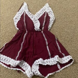 Red romper with lace